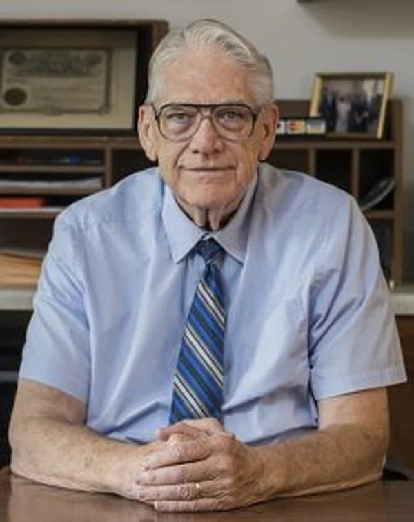 Dr. Jim Talley at his desk